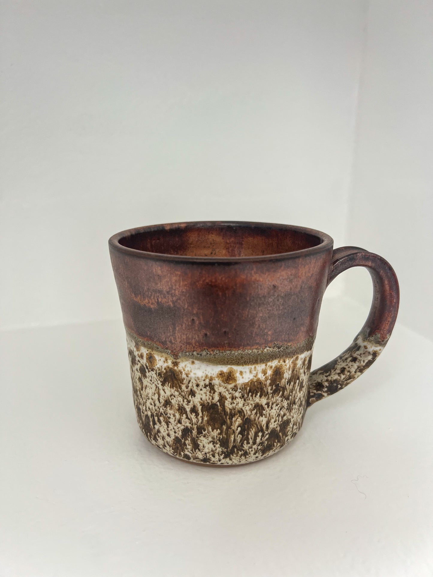 Copper and white speckled mug