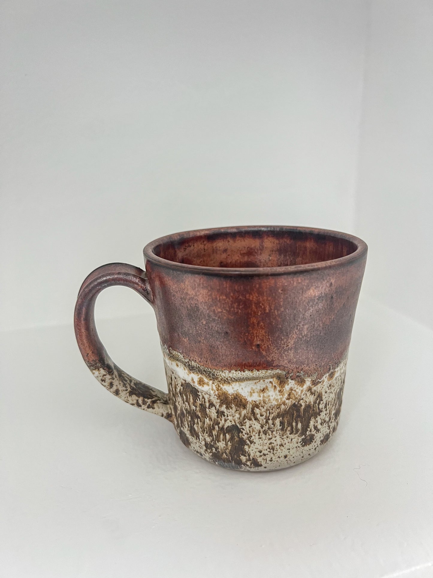 Copper and white speckled mug
