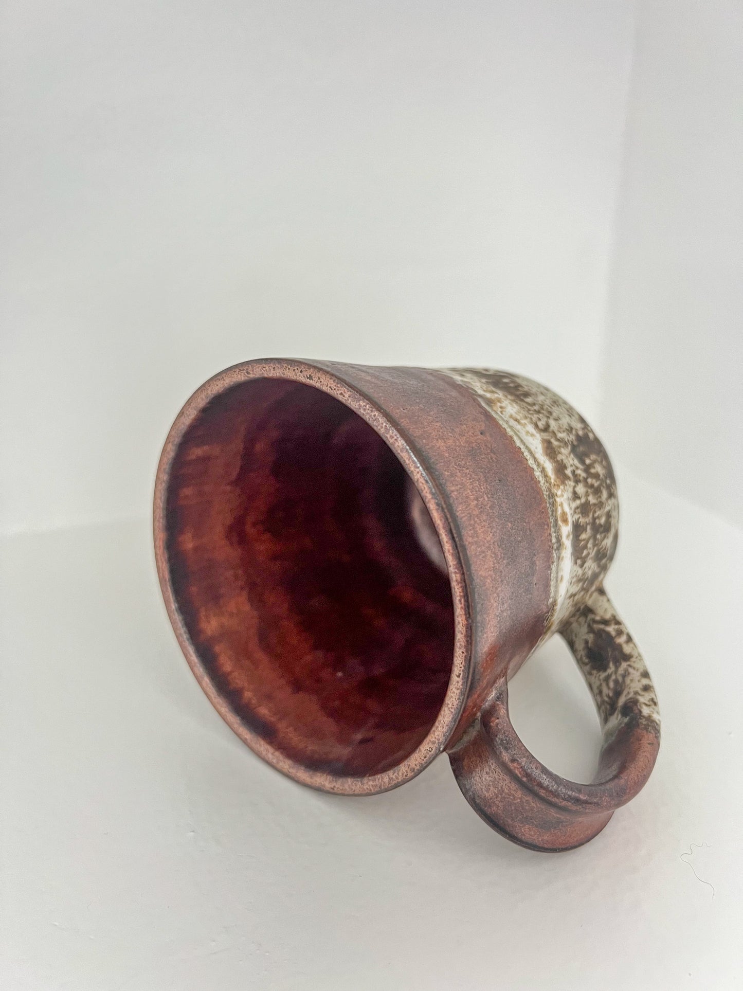 Copper and white speckled mug